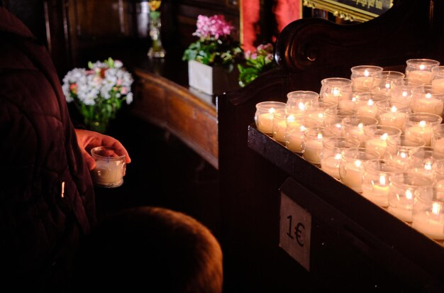 Man holding a candle